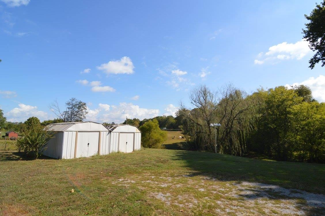 101 Bettis Road Lebanon, TN 37090 - Photo 6 of 20 a front view of a house with a yard and garage
