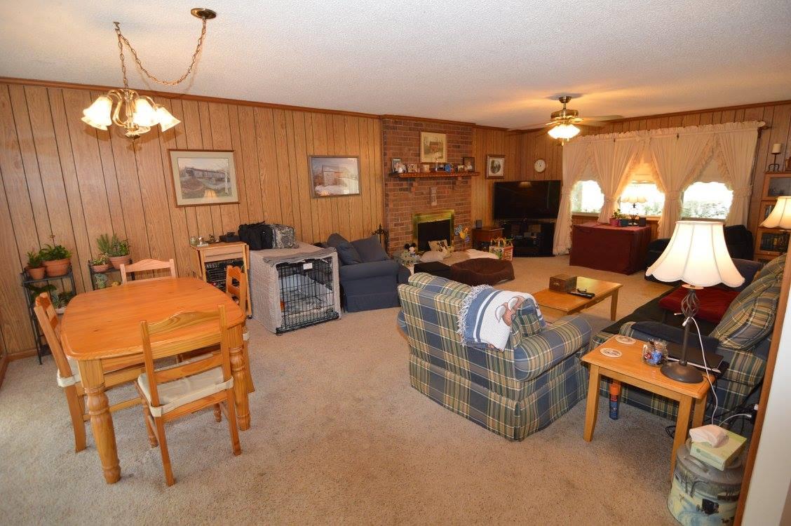101 Bettis Road Lebanon, TN 37090 - Photo 8 of 20 a living room with furniture a lamp and a chandelier