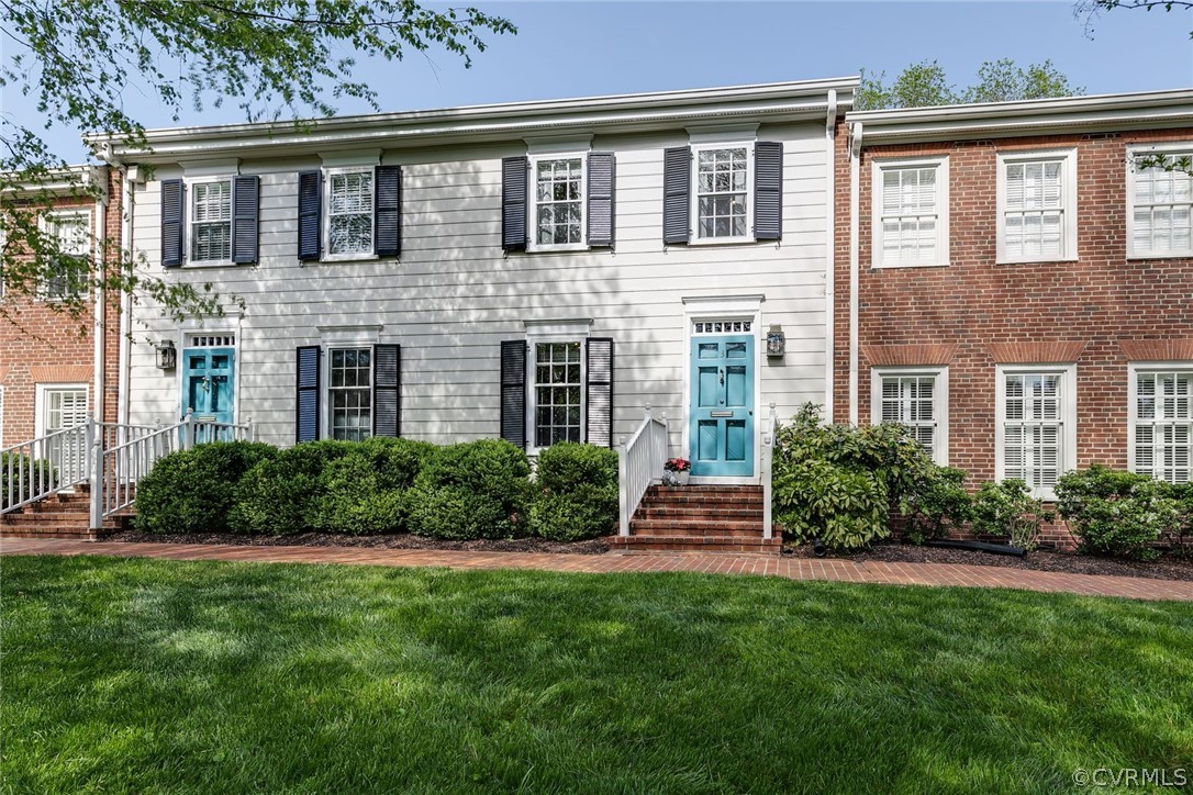 300 North Ridge Road, Unit 3 Richmond, VA 23229 - Photo 1 of 20 a front view of a house with a yard