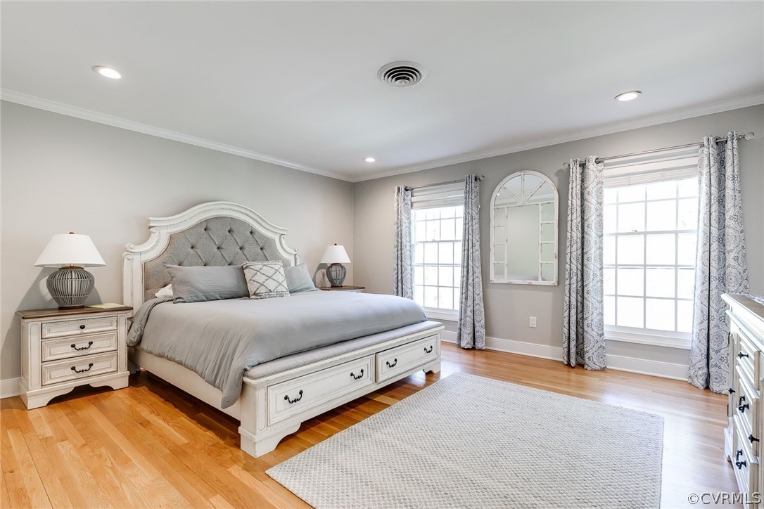 300 North Ridge Road, Unit 3 Richmond, VA 23229 - Photo 12 of 20 a spacious bedroom with a bed and a large window