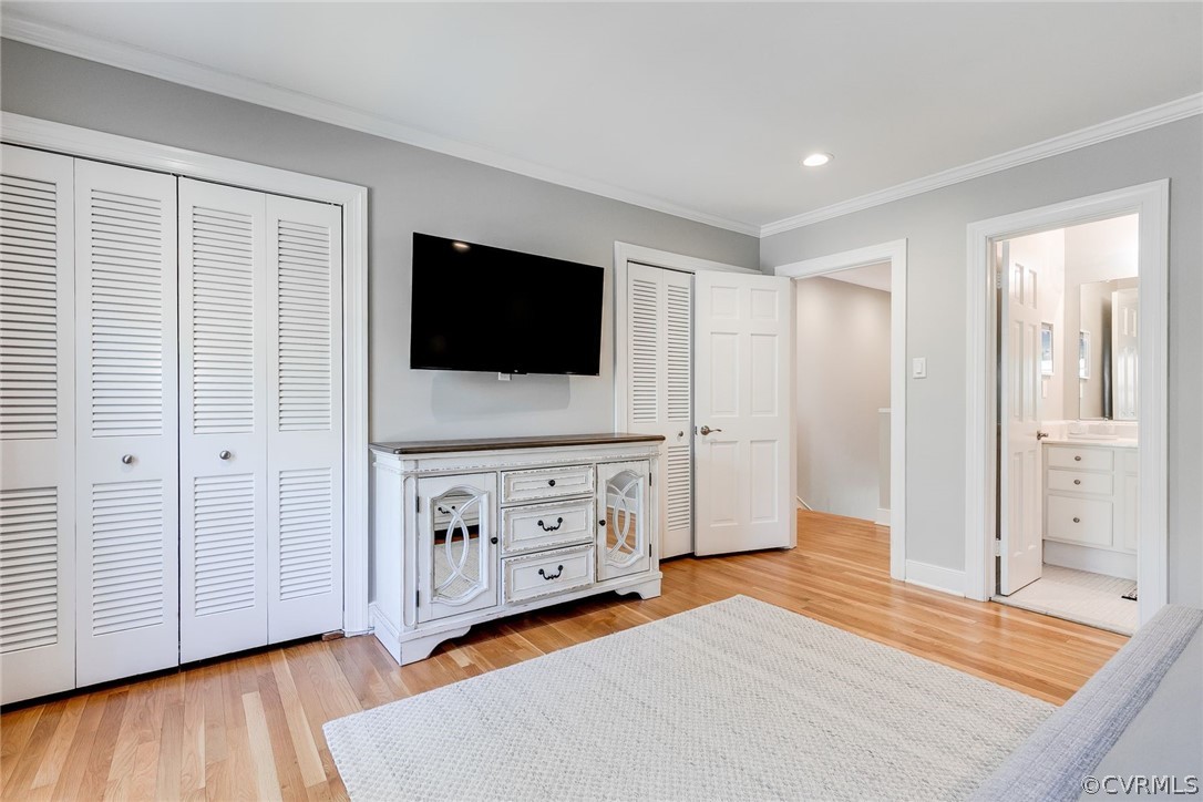 300 North Ridge Road, Unit 3 Richmond, VA 23229 - Photo 14 of 20 a bedroom with furniture and a flat screen tv