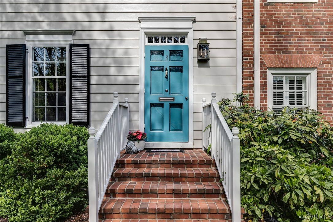 300 North Ridge Road, Unit 3 Richmond, VA 23229 - Photo 2 of 20 front view of a house with a potted plant and stairs