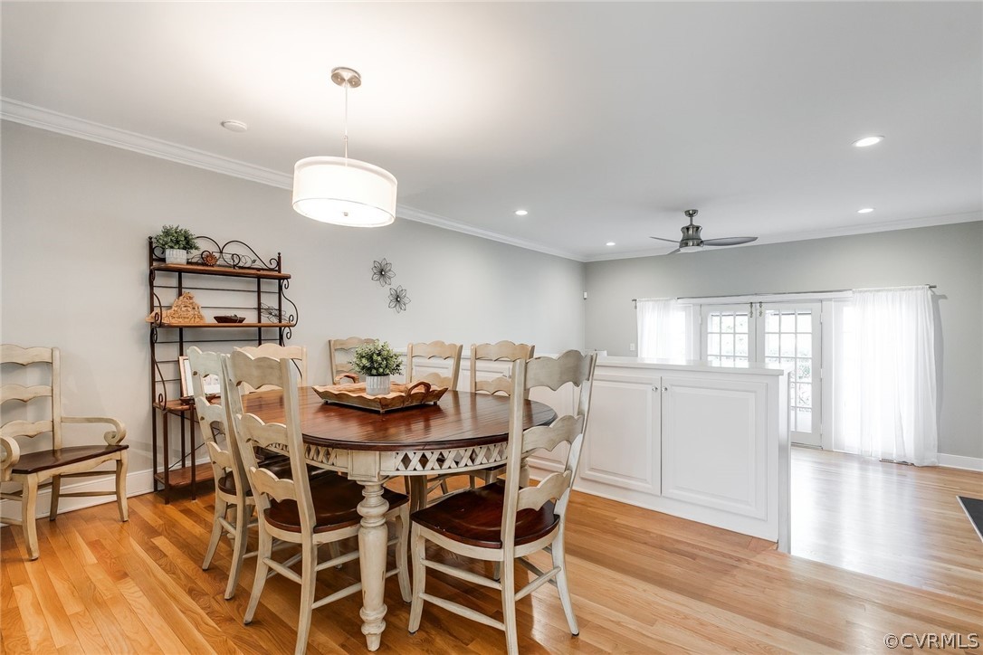 300 North Ridge Road, Unit 3 Richmond, VA 23229 - Photo 8 of 20 a view of a dining room with furniture and wooden floor