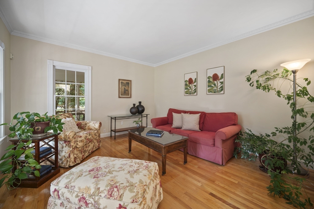 32 Bulkley Road Sudbury, MA 01776 - Photo 17 of 39 a living room with furniture plant and a window
