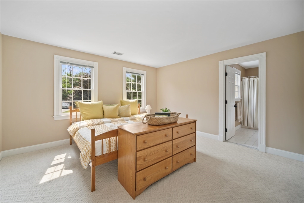 32 Bulkley Road Sudbury, MA 01776 - Photo 29 of 39 a bed room with a bed and a window