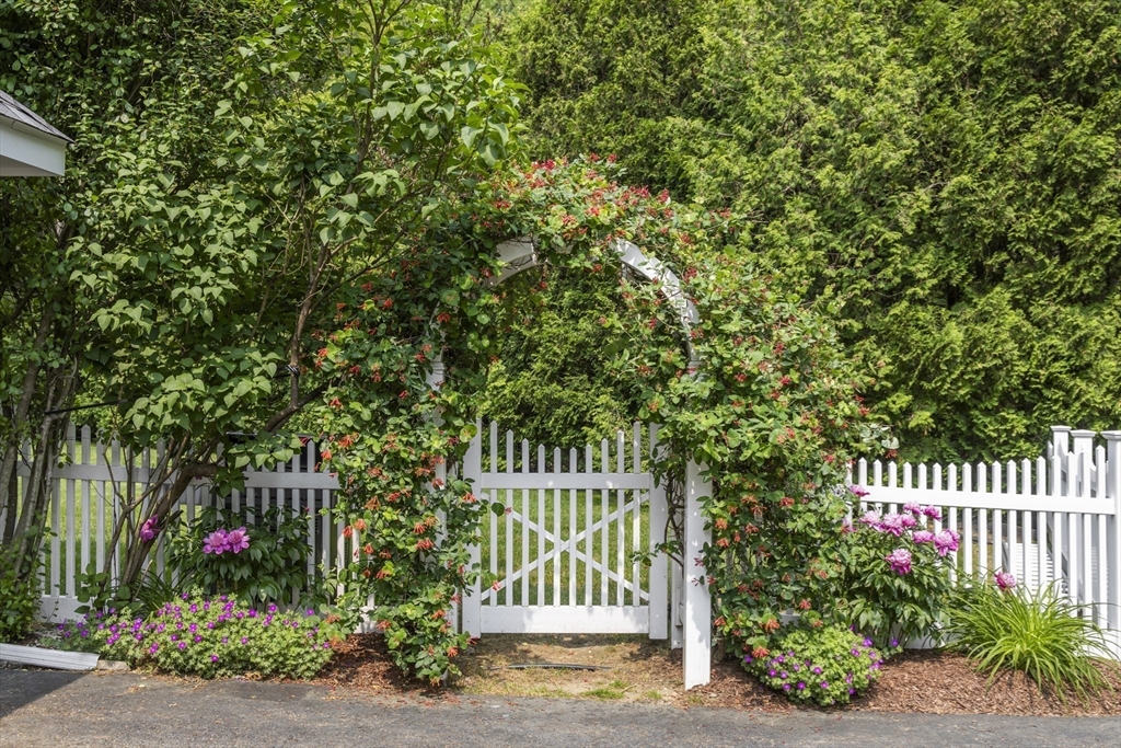 32 Bulkley Road Sudbury, MA 01776 - Photo 36 of 39 a view of a house with a garden