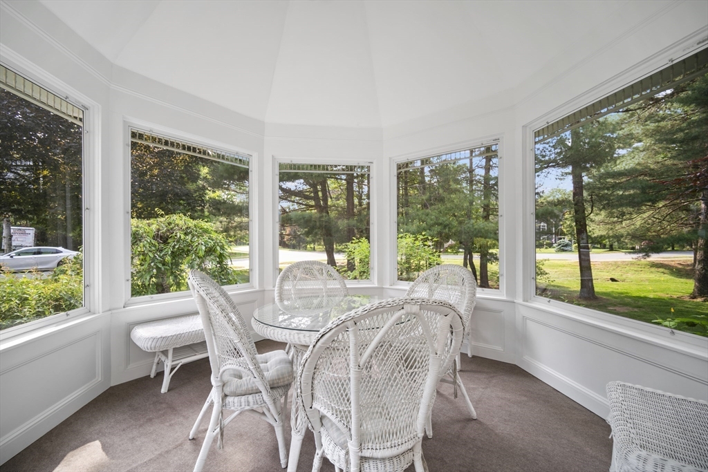 32 Bulkley Road Sudbury, MA 01776 - Photo 5 of 39 a view of a dining room with furniture window and outside view