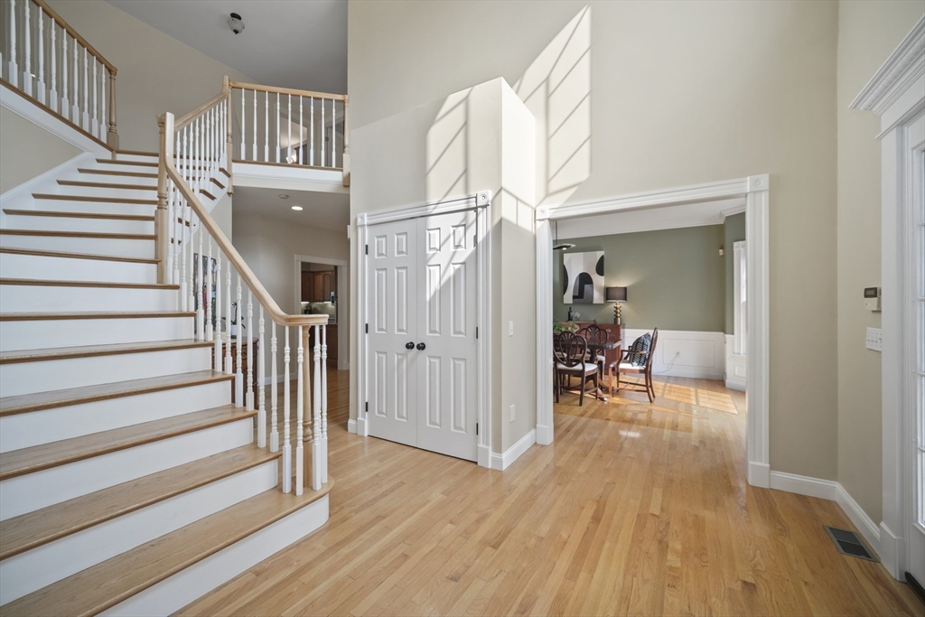 32 Bulkley Road Sudbury, MA 01776 - Photo 6 of 39 a view of entryway livingroom and hall with wooden floor