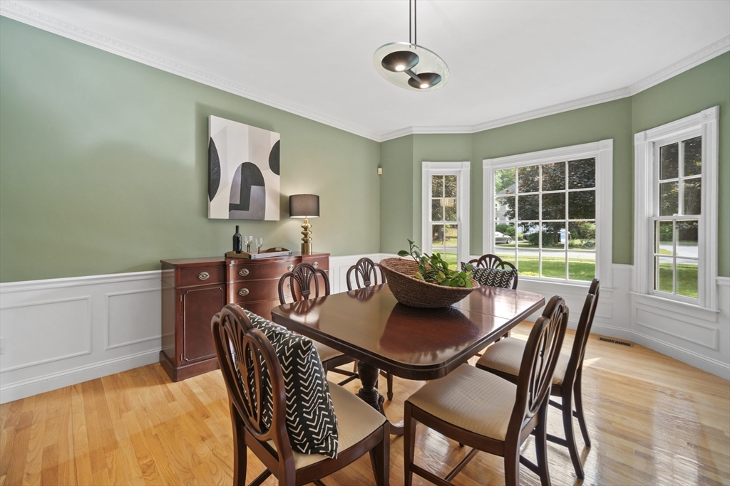 32 Bulkley Road Sudbury, MA 01776 - Photo 10 of 39 a view of a dining room with furniture window and outside view