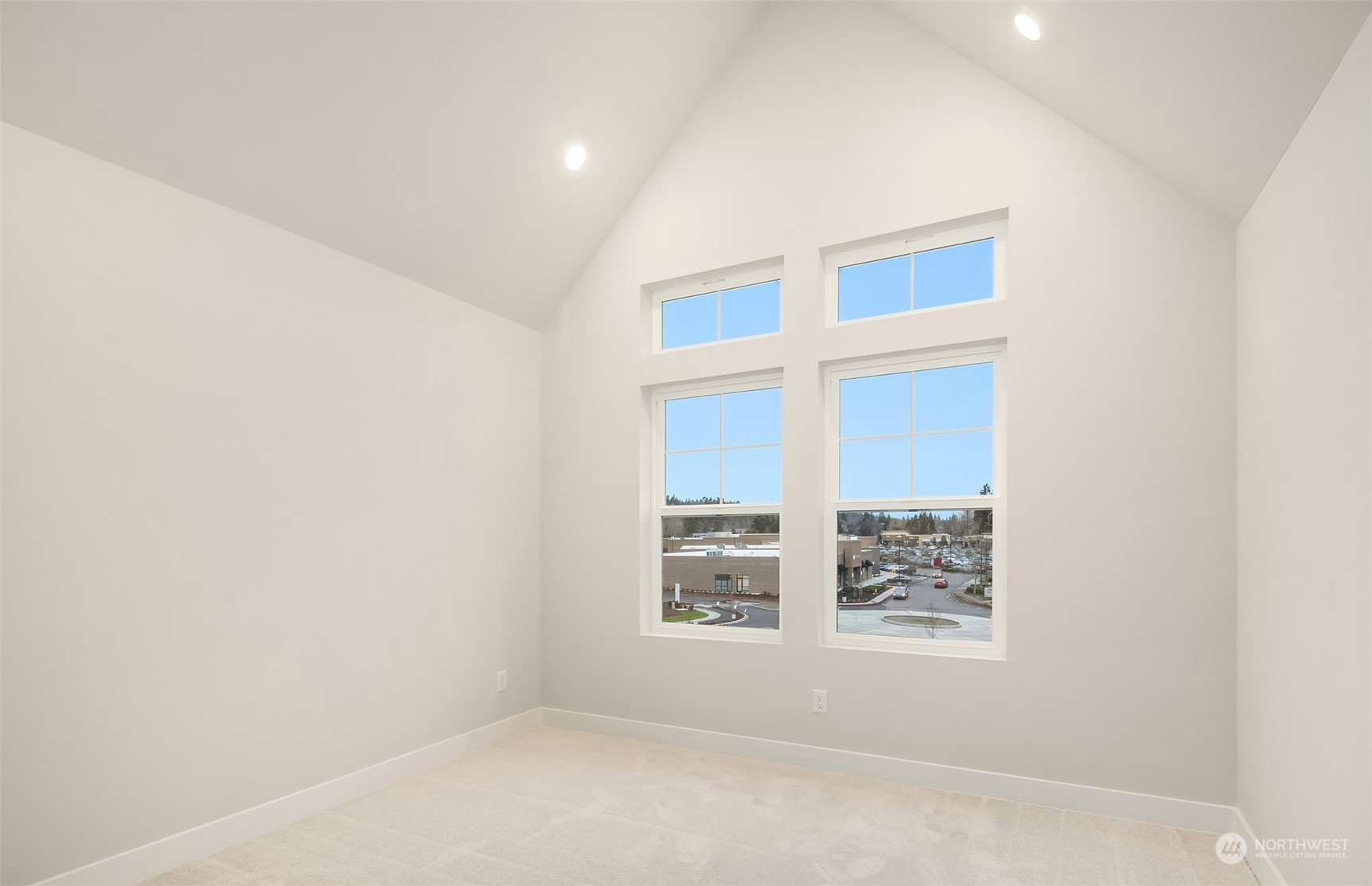 9013 Northeast 203rd Place, Unit B Bothell, WA 98021 - Photo 13 of 16 an empty room with windows