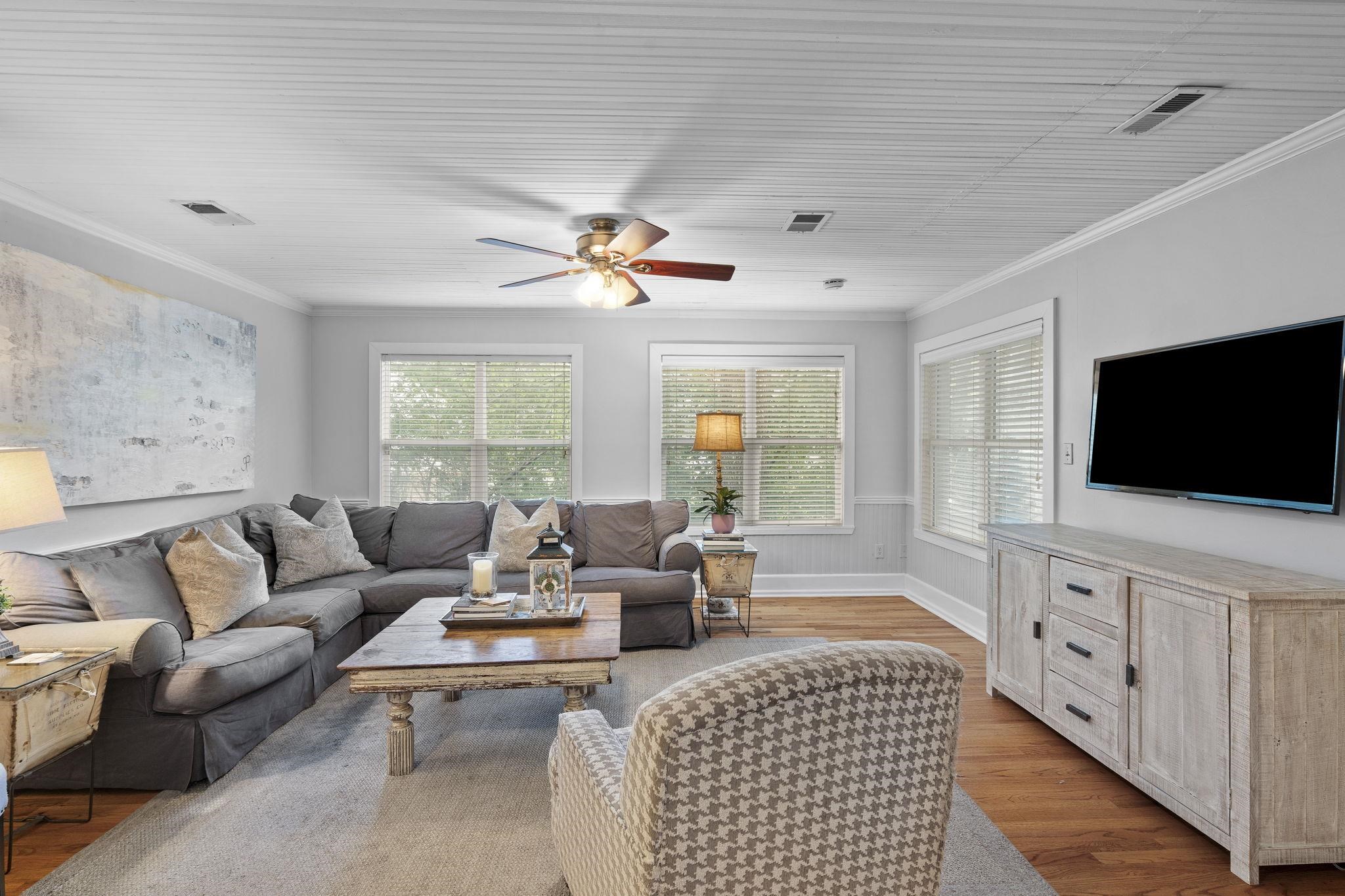 549 Peterson Lake Road Collierville, TN 38017 - Photo 12 of 34 a living room with furniture and a flat screen tv