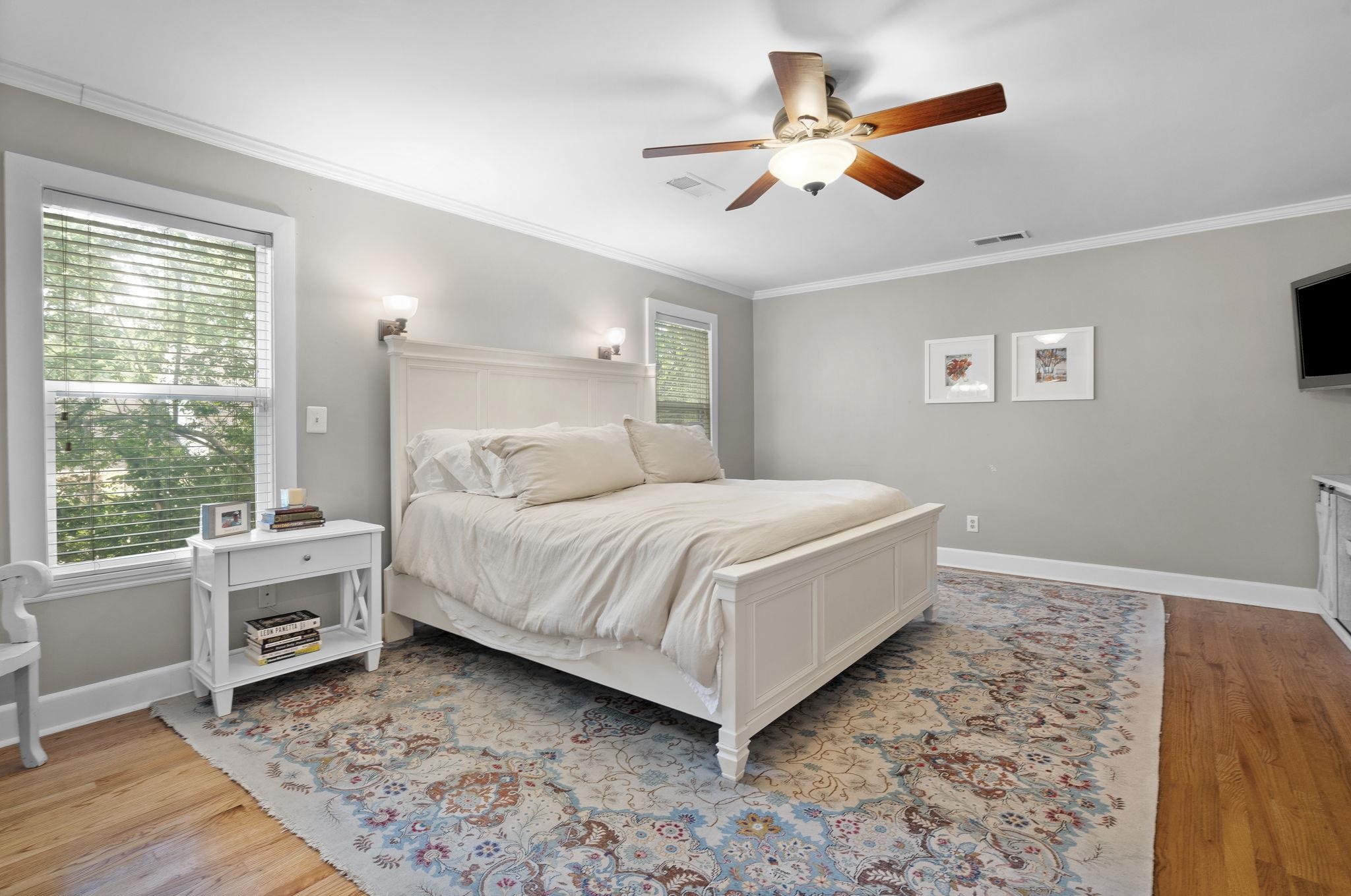 549 Peterson Lake Road Collierville, TN 38017 - Photo 15 of 34 a bedroom with a large bed and a window