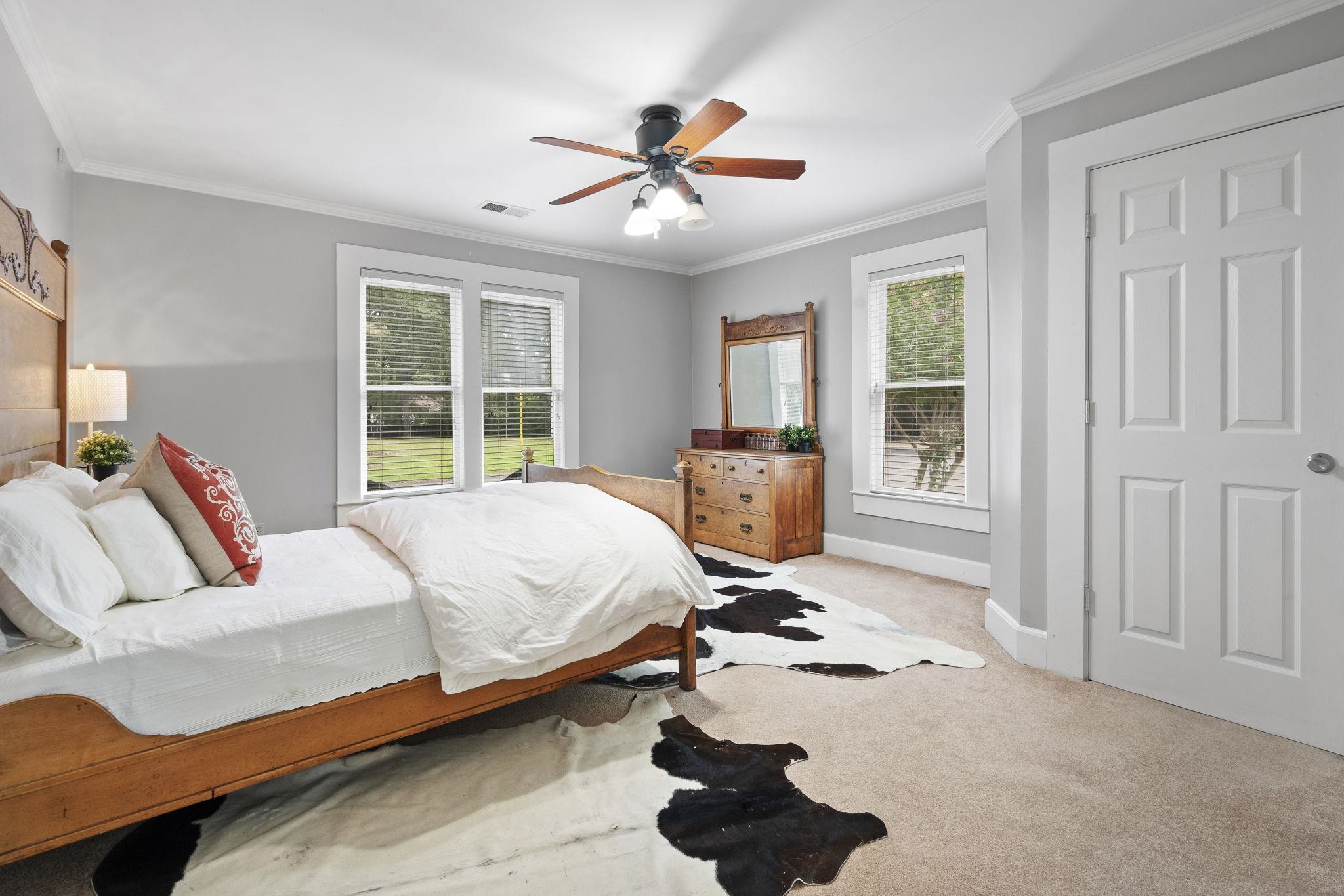 549 Peterson Lake Road Collierville, TN 38017 - Photo 18 of 34 a bedroom with furniture and a window