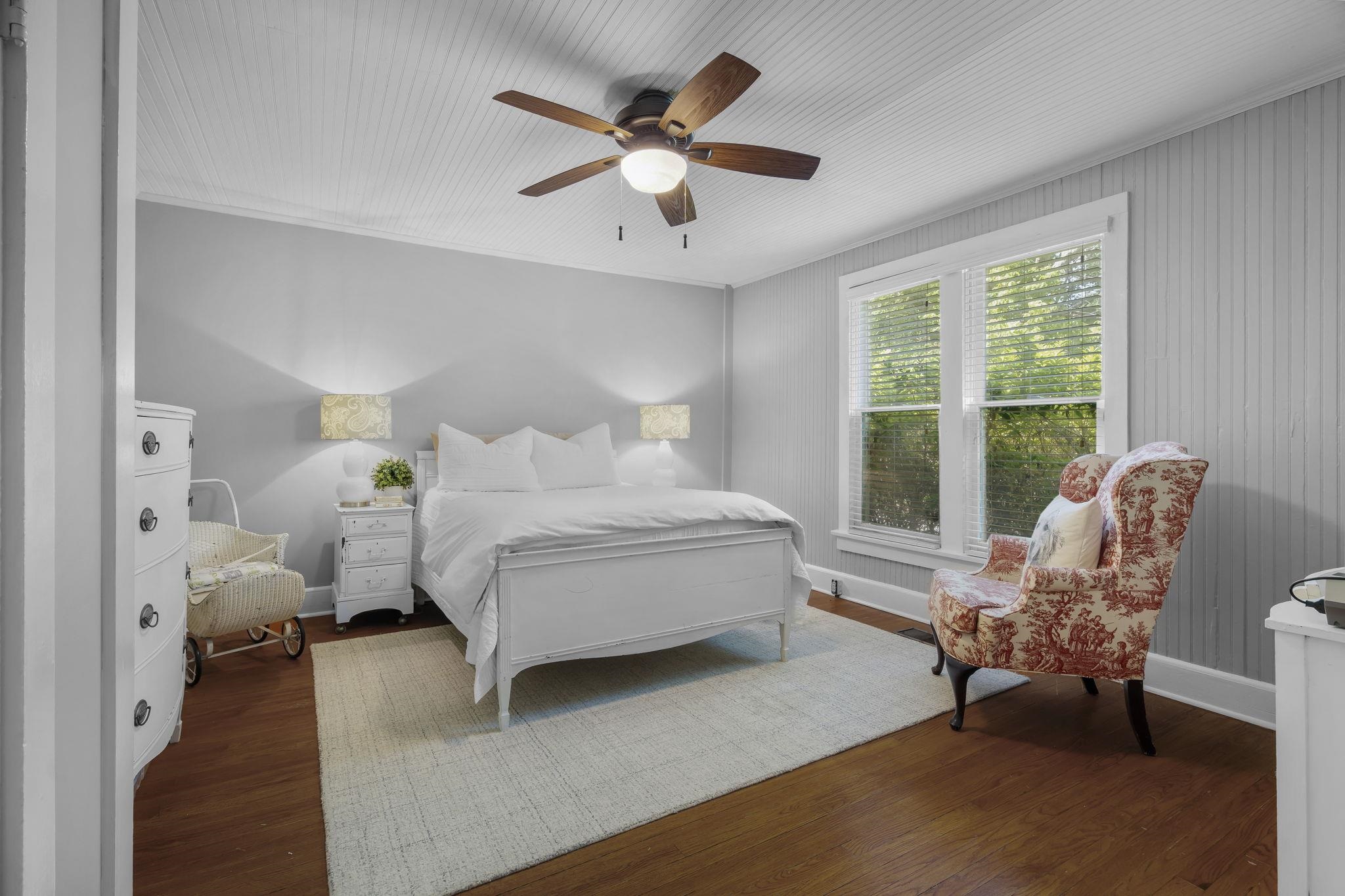 549 Peterson Lake Road Collierville, TN 38017 - Photo 19 of 34 a bed room with a bed and a chair