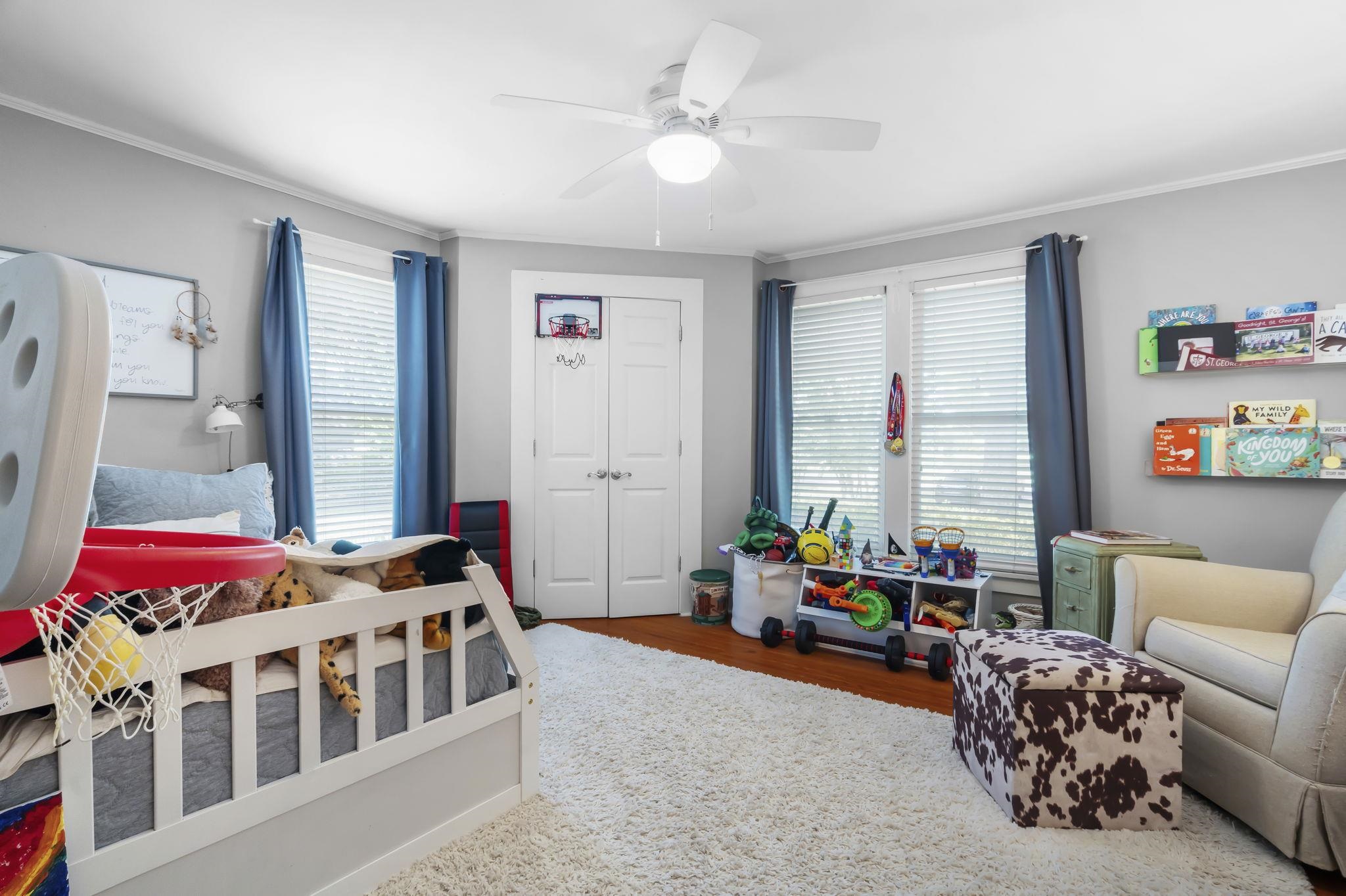 549 Peterson Lake Road Collierville, TN 38017 - Photo 21 of 34 a bedroom with furniture and a large window