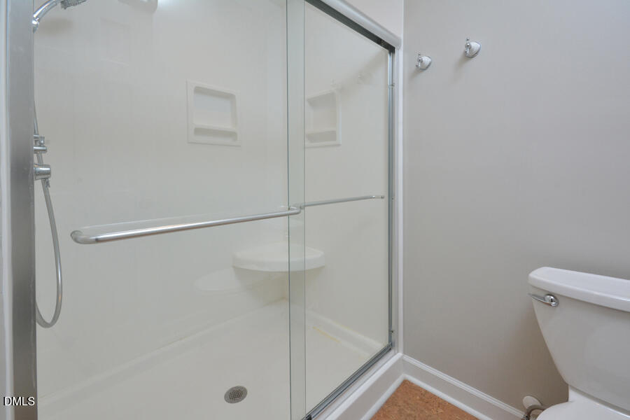 401 Martindale Drive Raleigh, NC 27614 - Photo 21 of 35 a bathroom with a shower and a toilet