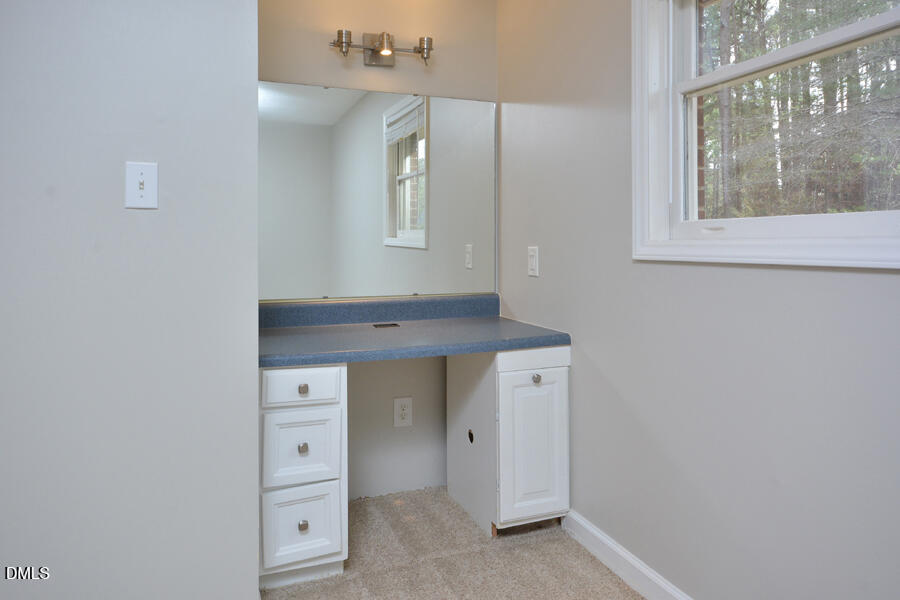 401 Martindale Drive Raleigh, NC 27614 - Photo 23 of 35 a view of cabinets and window