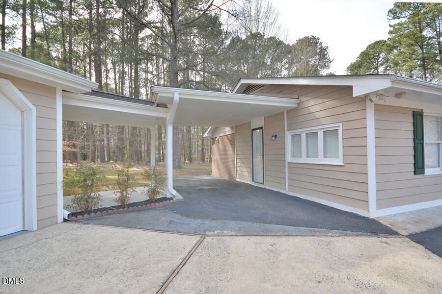 401 Martindale Drive Raleigh, NC 27614 - Photo 27 of 35 a front view of a house with garden
