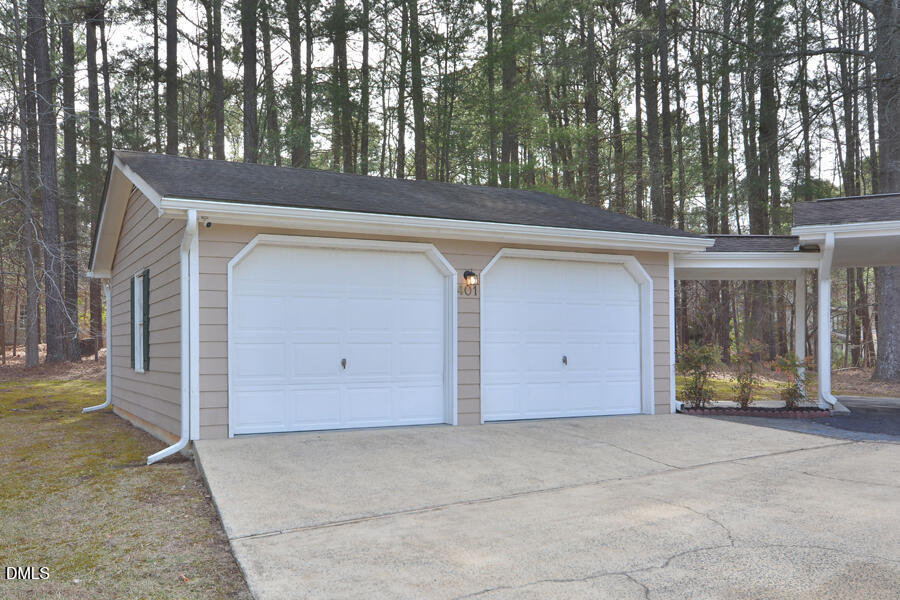 401 Martindale Drive Raleigh, NC 27614 - Photo 28 of 35 a front view of a house with garage