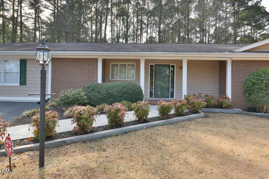 401 Martindale Drive Raleigh, NC 27614 - Photo 5 of 35 front view of a house with a yard