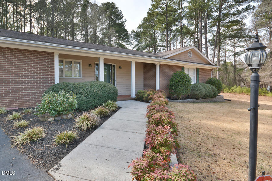 401 Martindale Drive Raleigh, NC 27614 - Photo 6 of 35 front view of a house with a yard