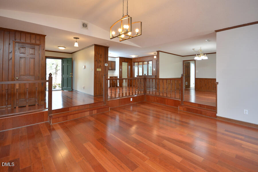 401 Martindale Drive Raleigh, NC 27614 - Photo 10 of 35 a view of empty room with wooden floor