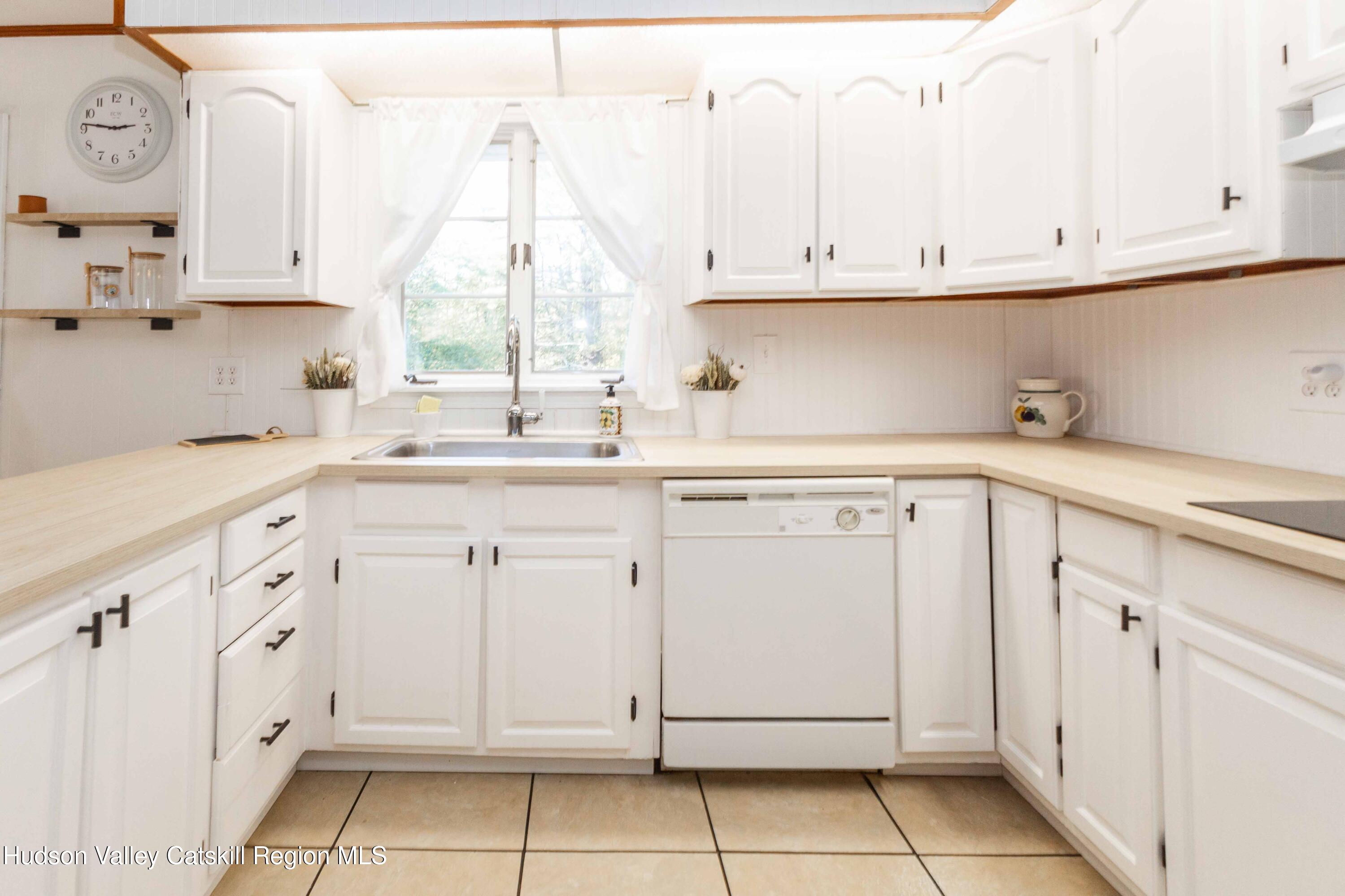 94 Lodge Road Saugerties, NY 12477 - Photo 19 of 47 a view of cabinets and window