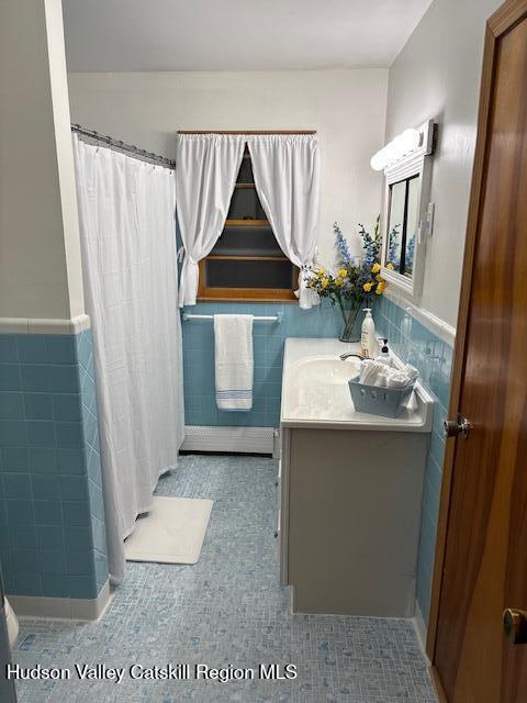 94 Lodge Road Saugerties, NY 12477 - Photo 25 of 46 a bathroom with a sink toilet and shower