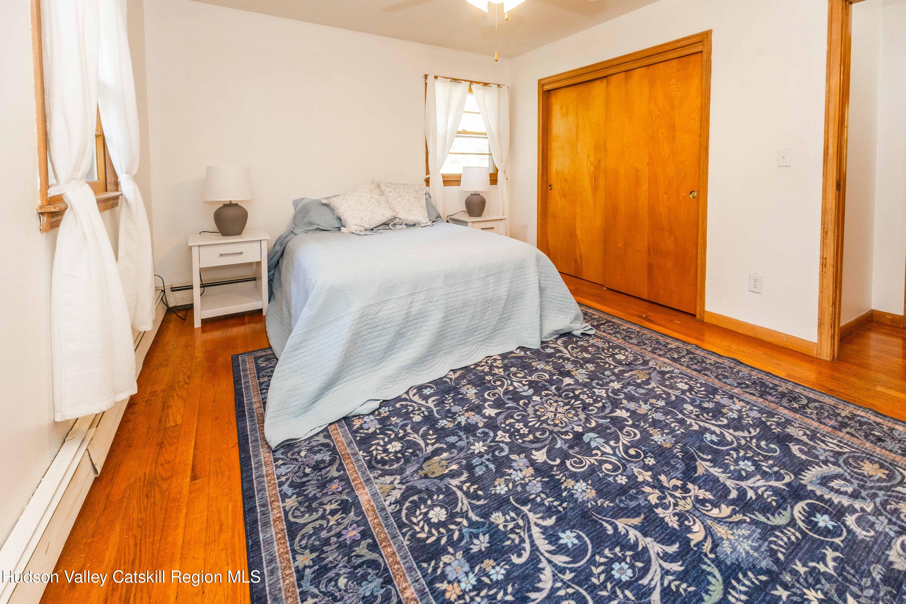 94 Lodge Road Saugerties, NY 12477 - Photo 28 of 46 a bedroom with a bed and a window