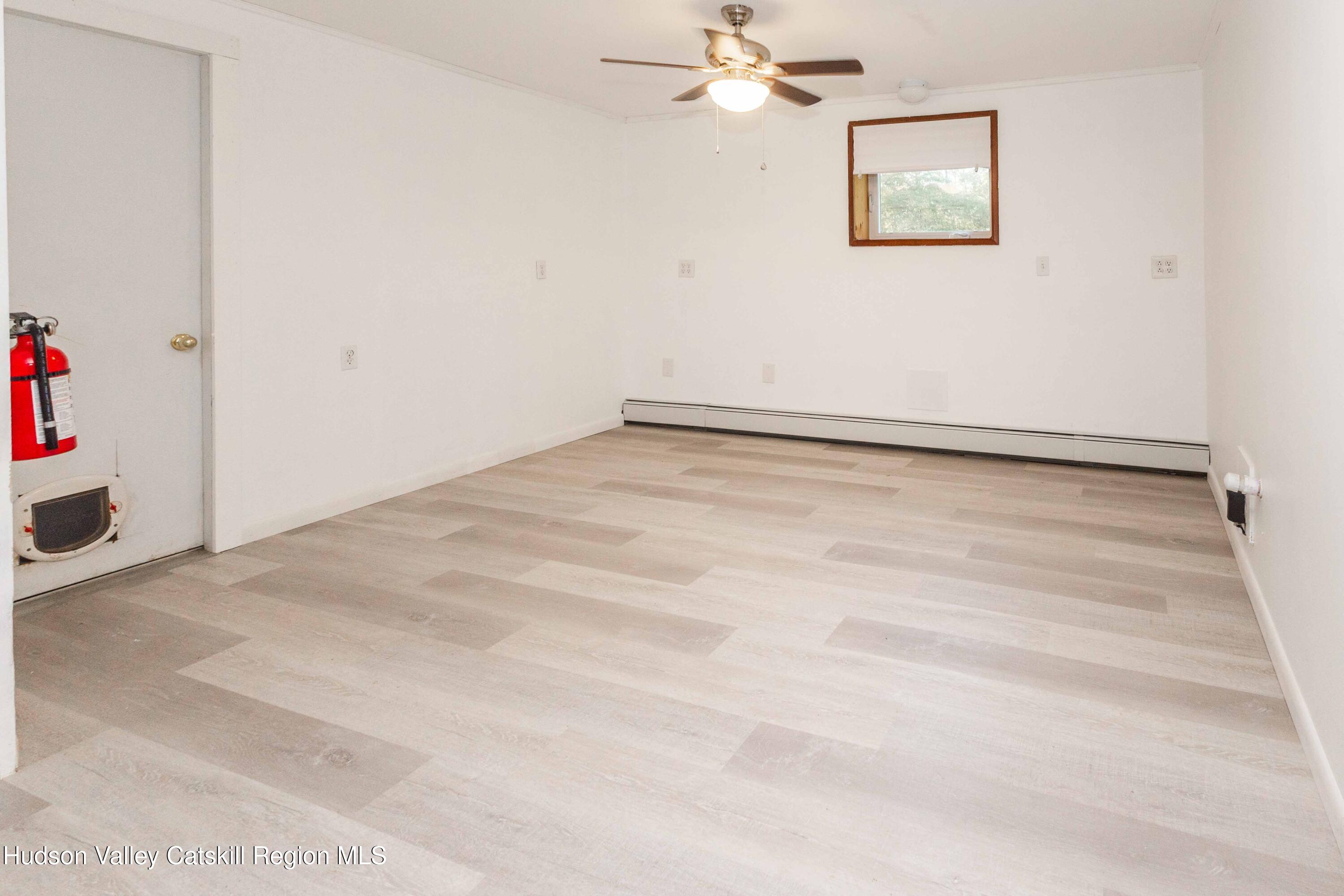 94 Lodge Road Saugerties, NY 12477 - Photo 35 of 46 a view of a room with wooden floor and closet