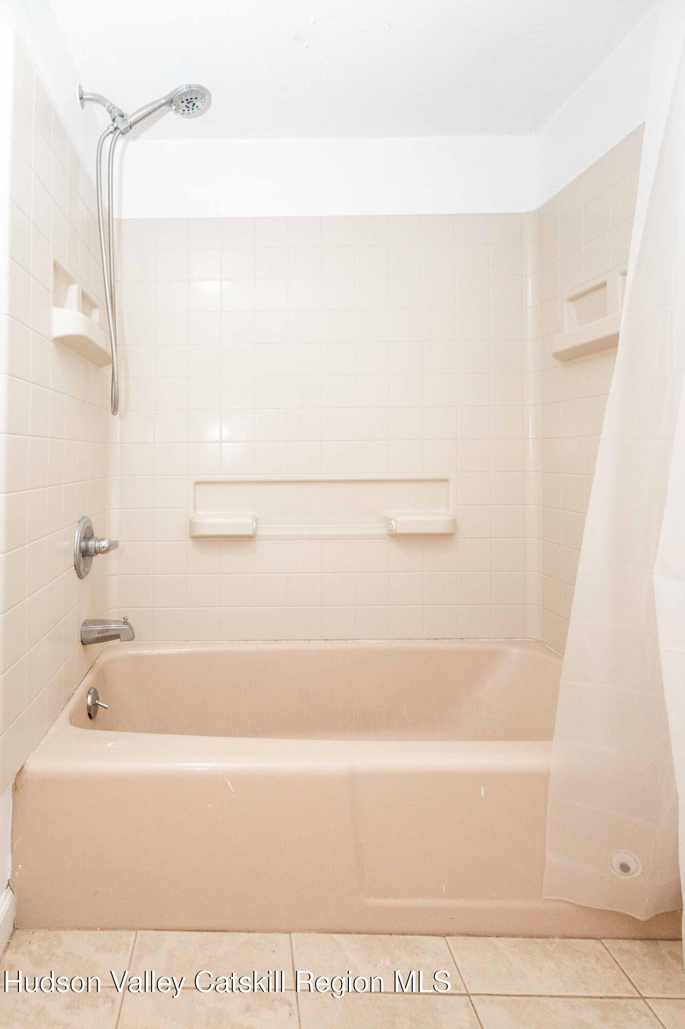 94 Lodge Road Saugerties, NY 12477 - Photo 44 of 47 a bathroom with a bathtub