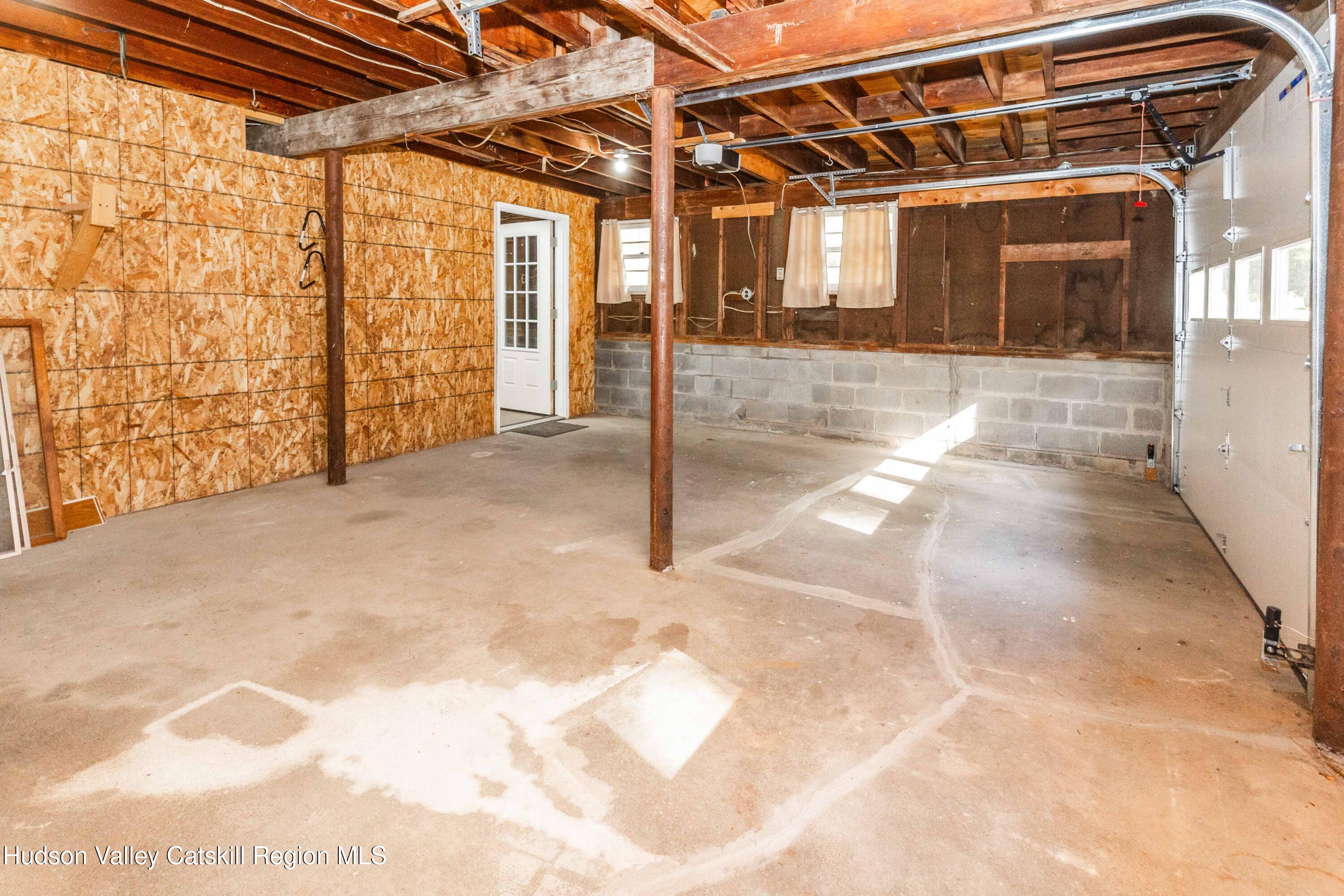 94 Lodge Road Saugerties, NY 12477 - Photo 47 of 47 a view of a porch with a table and chairs