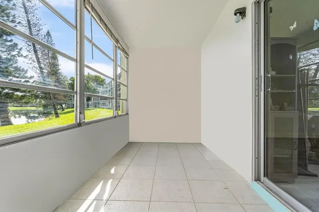 a view of an empty room and window