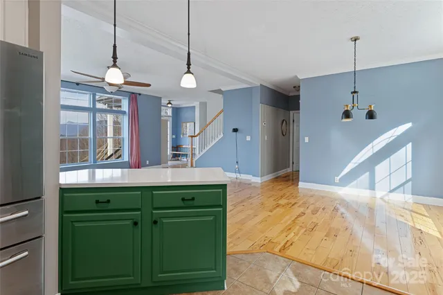 a view of a kitchen with a sink and dishwasher