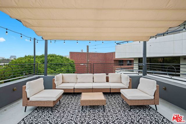 a building outdoor space with patio furniture