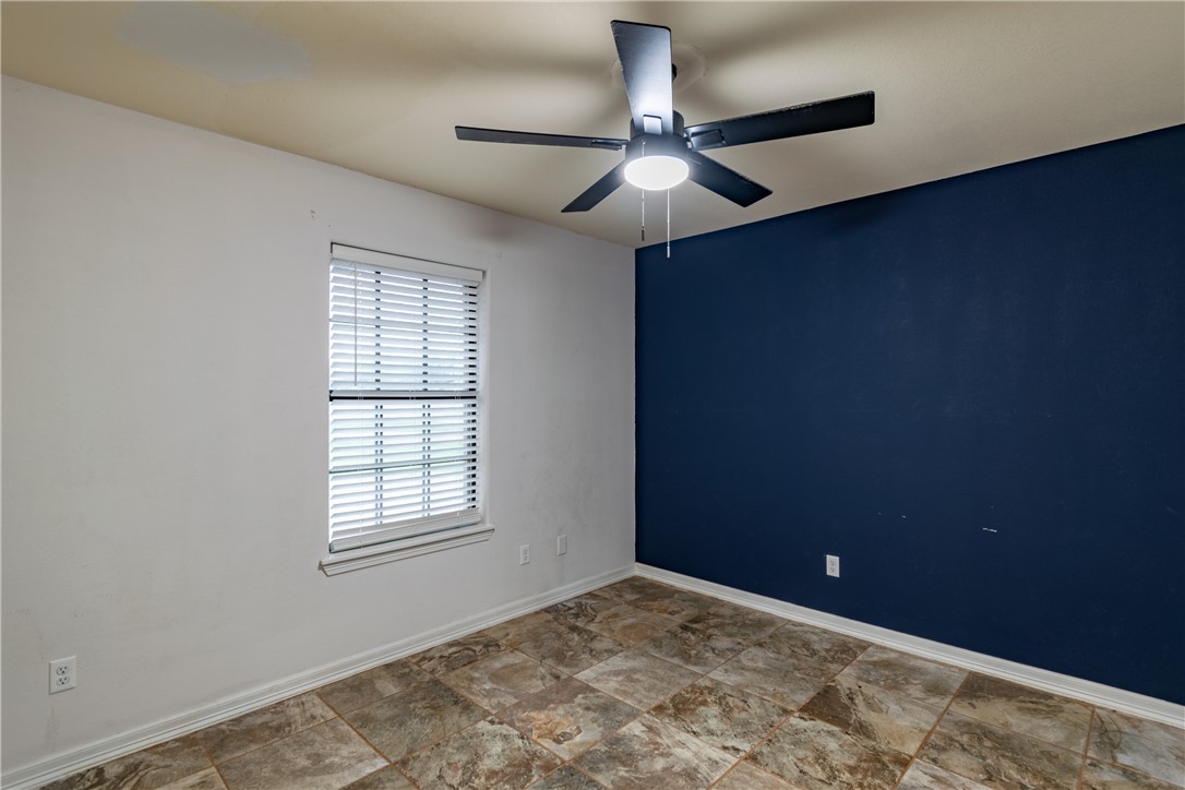 204 County Road 1331 Alice, TX 78332 - Photo 20 of 30 a view of empty room with window and ceiling fan