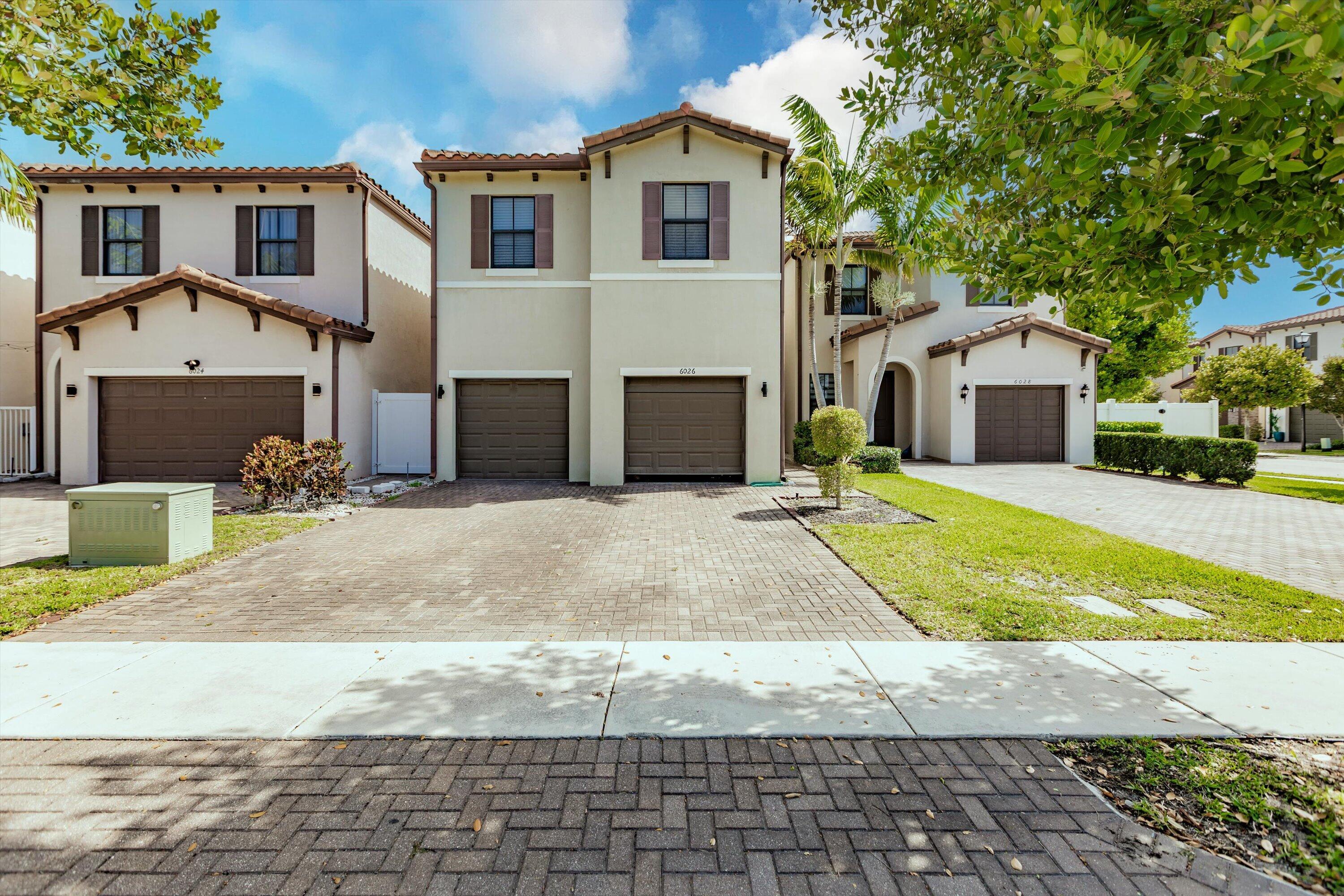 6026 Pine Tree Way, Unit 6026 Riviera Beach, FL 33410 - Photo 2 of 31 02-Property Photo 002