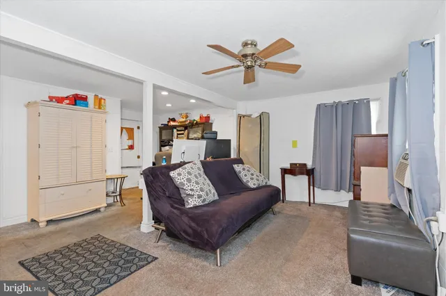 a bedroom with a bed and furniture