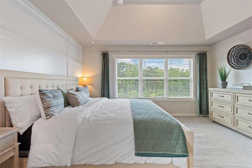 35 Cobalt Lane Newnan, GA 30265 - Photo 11 of 19 a bedroom with a bed and a window