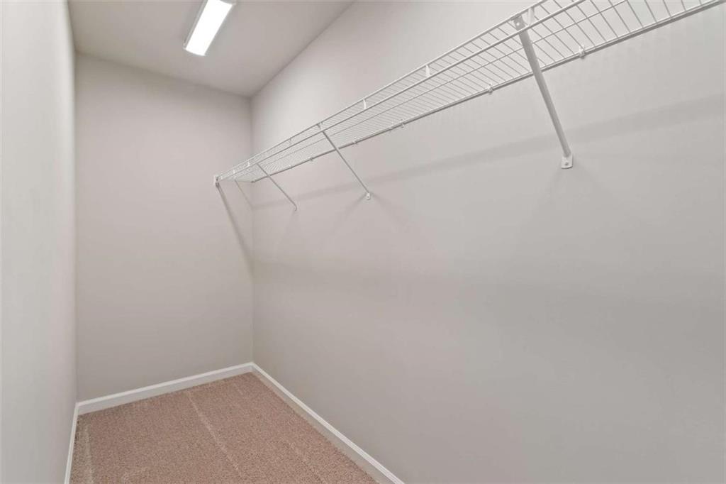 35 Cobalt Lane Newnan, GA 30265 - Photo 15 of 19 a view of a rack on the wall