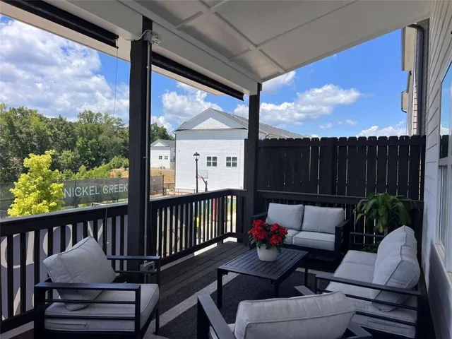 a view of a two chairs in the deck