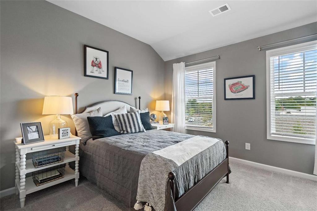 35 Cobalt Lane Newnan, GA 30265 - Photo 10 of 19 a bedroom with a bed and a window