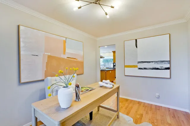 a view of dining room and livingroom with furniture