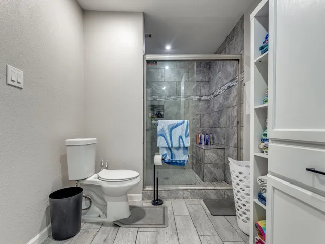 a view of a kitchen counter top space and cabinets