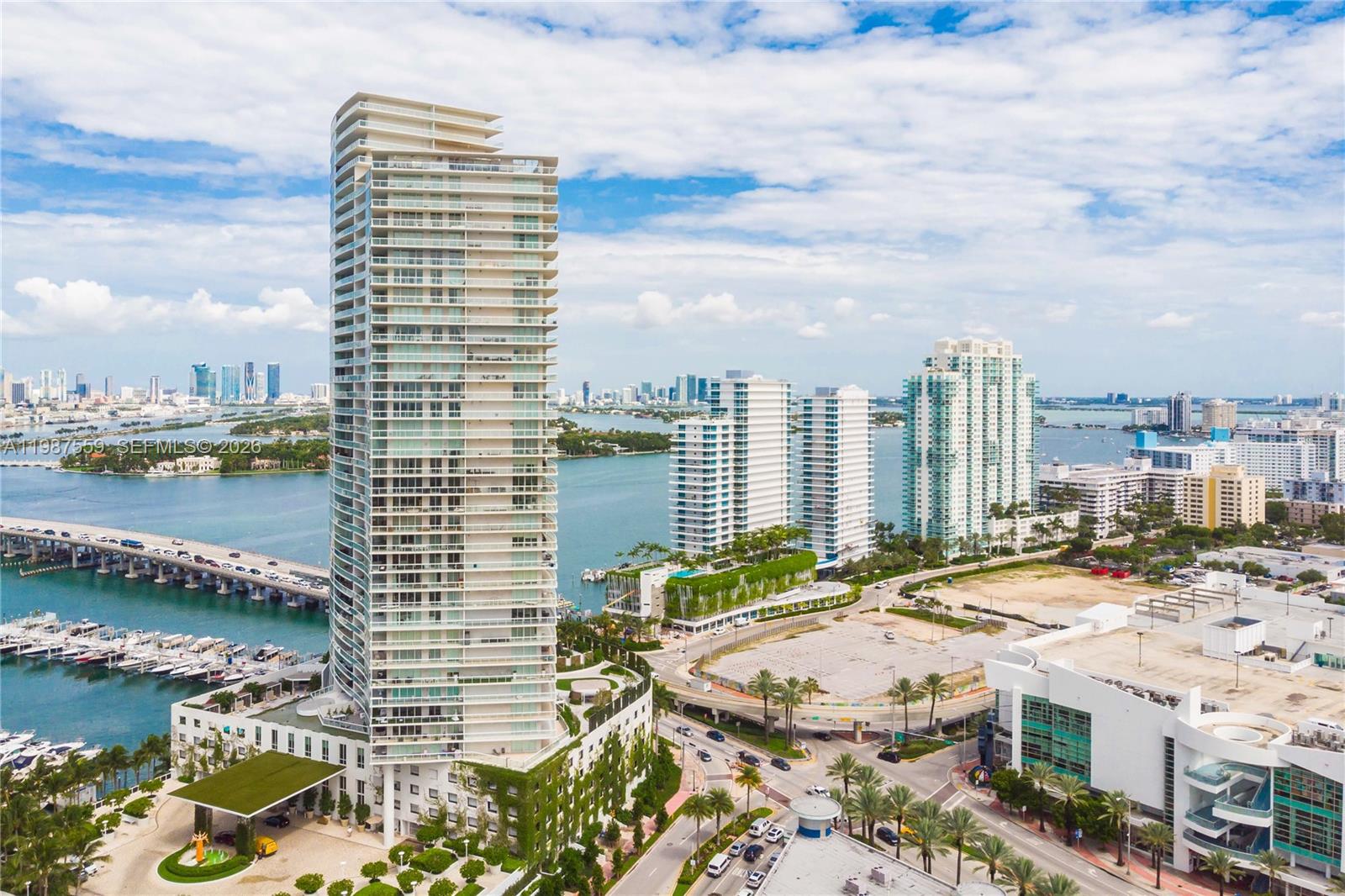 a view of city with ocean