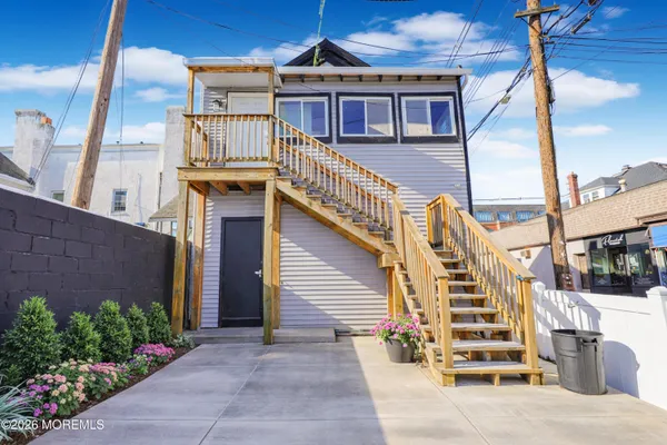 a view of a house with a deck