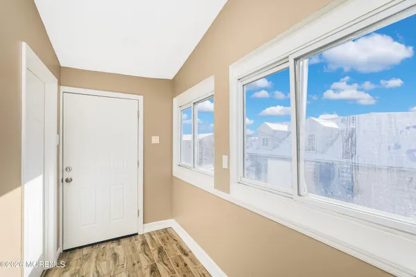a view of an empty room and window