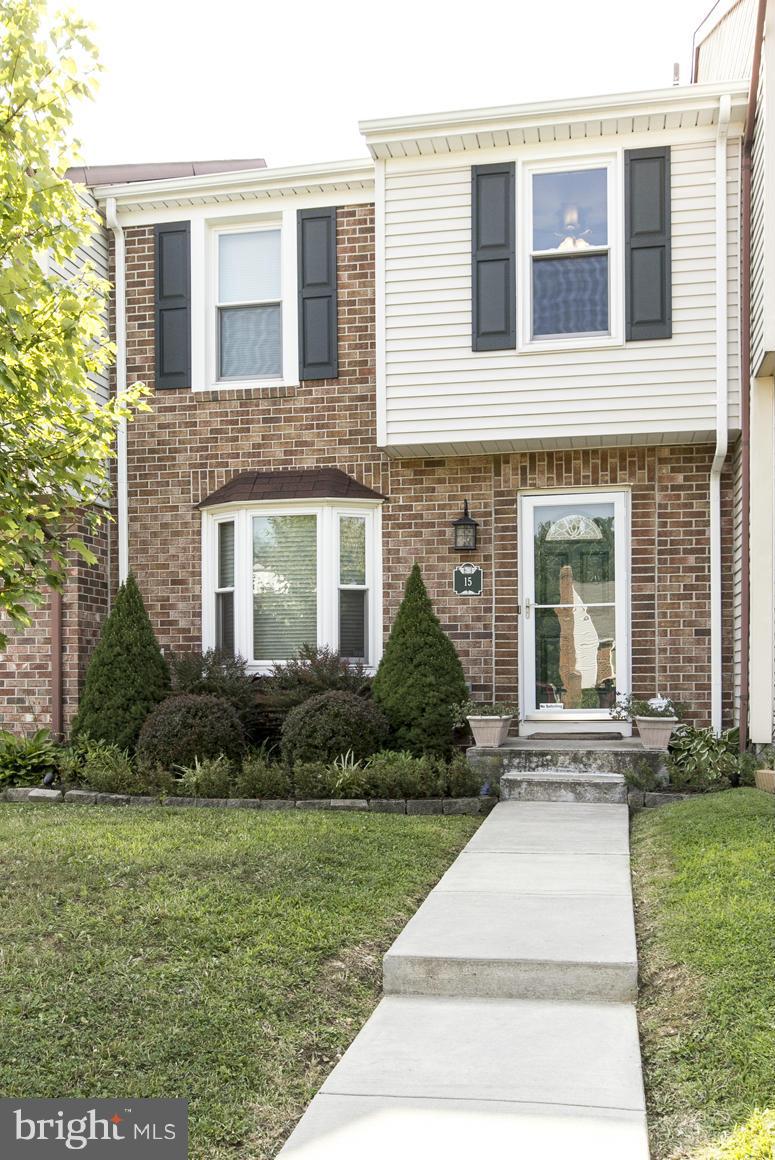 15 Robin Ridge Court Baltimore, MD 21234 - Photo 1 of 30 a front view of a house with garden