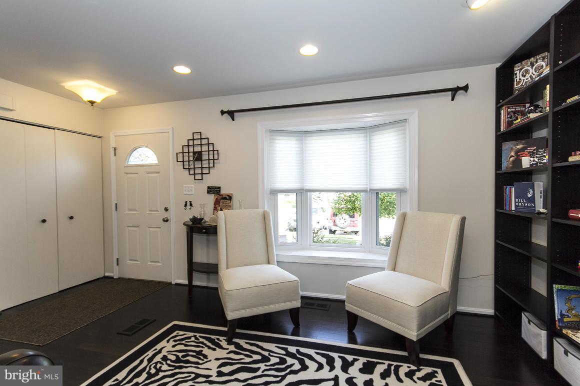 15 Robin Ridge Court Baltimore, MD 21234 - Photo 15 of 30 a living room with furniture and a window