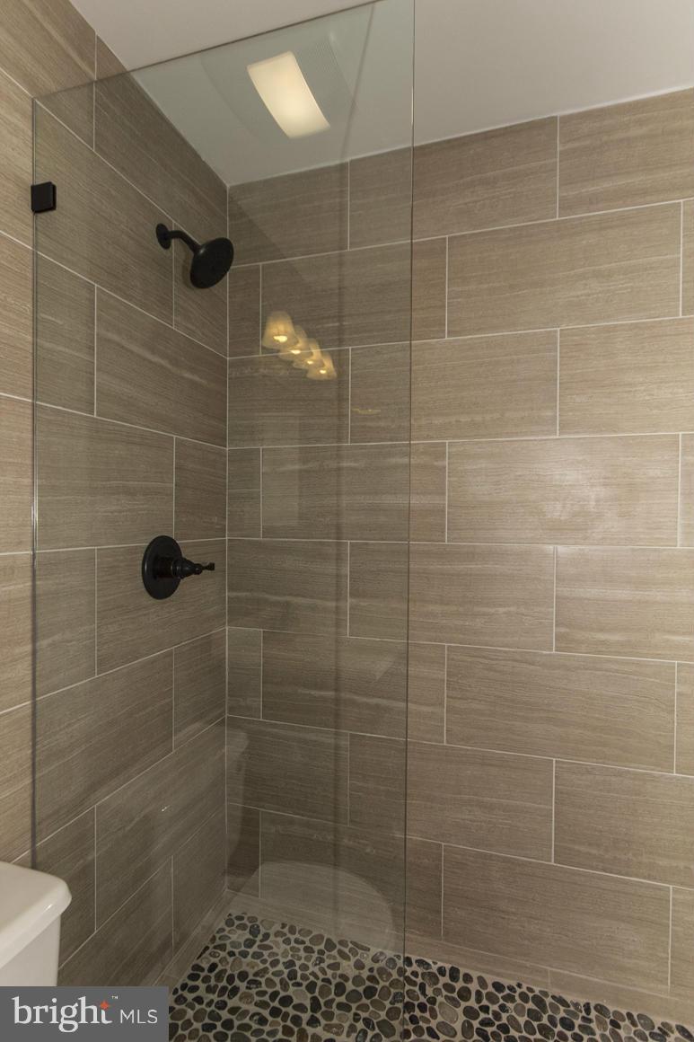 15 Robin Ridge Court Baltimore, MD 21234 - Photo 19 of 30 a bathroom with a shower